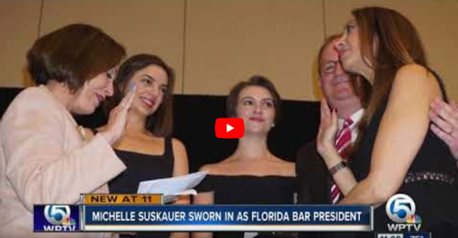 video screenshot of Michelle Suskauer being sworn in as President of the Florida bar alongside her husband and two daughters
