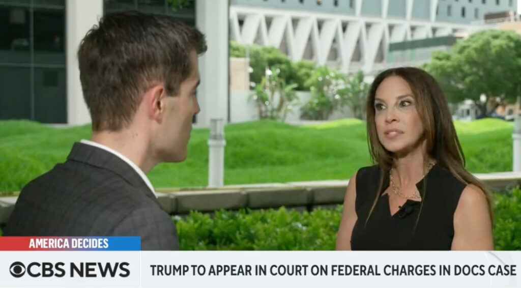 Michelle Suskauer appearing on CBS News. Text "Trump to appear in court on federal charges in docs case"